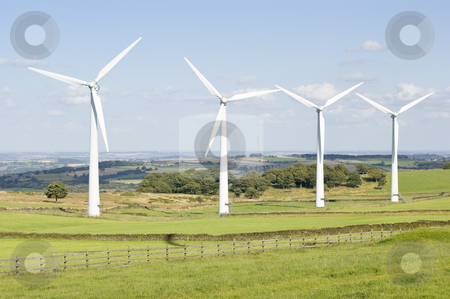To use this stock image in your creative project, please select the size you need over to the right and click the "Add to Cart" button.
Your downloaded image will come with the Cutcaster watermark removed so don’t worry about the watermark you see on this page. Wind Farm Yorkshire stock photo, Power generation wind farm 35m in height to the hub and have a rotor diameter of 37m by Stephen Meese