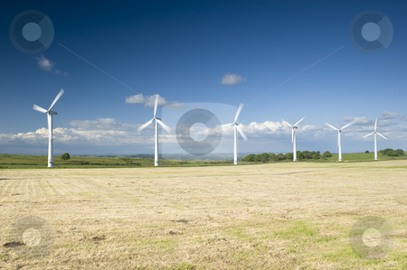 To use this stock image in your creative project, please select the size you need over to the right and click the "Add to Cart" button.
Your downloaded image will come with the Cutcaster watermark removed so don’t worry about the watermark you see on this page. Wind Farm Yorkshire stock photo, Power generation wind farm 35m in height to the hub and have a rotor diameter of 37m by Stephen Meese