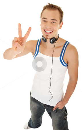To use this stock image in your creative project, please select the size you need over to the right and click the "Add to Cart" button.
Your downloaded image will come with the Cutcaster watermark removed so don’t worry about the watermark you see on this page. I am free to listen my music stock photo, Smiling handsome young man in casual style with headphones shows sign freedom, isolated on white background by Iryna Rasko