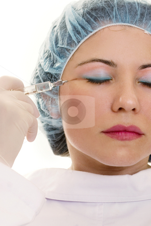 To use this stock image in your creative project, please select the size you need over to the right and click the "Add to Cart" button.
Your downloaded image will come with the Cutcaster watermark removed so don’t worry about the watermark you see on this page. Eternal Youth stock photo, Botox belongs to a class of drugs called botulinum toxins, which derive from the bacterium Clostridium botulinum. Many common medicines, such as penicillin and other antibiotics, also derive from moulds.
The bacterium produces a protein that blocks the release of acetylcholine, which normally transmits messages from the nerves to the muscles to make them contract and move. Once transmission has been blocked, muscles relax, providing relief to patients with overactive muscles, reducing spasms and pain. The effect is completely reversible and generally lasts for a few months in most clinical uses. Botox is approved for the following conditions:
1. frown lines
2. crossed eyes
3. eye and facial spasms
4. wry neck
5. foot deformity
6. spasticity
7. sweating by Leah-Anne Thompson