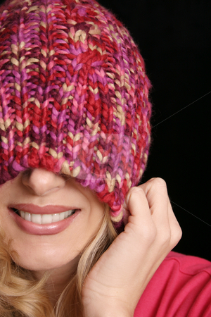 To use this stock image in your creative project, please select the size you need over to the right and click the "Add to Cart" button.
Your downloaded image will come with the Cutcaster watermark removed so don’t worry about the watermark you see on this page. Hide - smiling female hiding her face stock photo, Girl pulls woollen beanie over face in playful manner by Leah-Anne Thompson