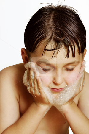 To use this stock image in your creative project, please select the size you need over to the right and click the "Add to Cart" button.
Your downloaded image will come with the Cutcaster watermark removed so don’t worry about the watermark you see on this page. Wash your face stock photo, A boy washing cleaning his face by Leah-Anne Thompson