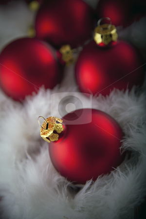 To use this stock image in your creative project, please select the size you need over to the right and click the "Add to Cart" button.
Your downloaded image will come with the Cutcaster watermark removed so don’t worry about the watermark you see on this page. Christmas decorations stock photo, Red christmas baubles by Portokalis