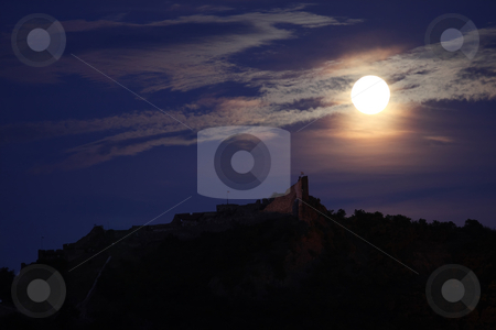 To use this stock image in your creative project, please select the size you need over to the right and click the "Add to Cart" button.
Your downloaded image will come with the Cutcaster watermark removed so don’t worry about the watermark you see on this page. Full moon stock photo, A full moon is above a castle by ARPAD RADOCZY