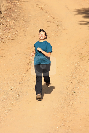To use this stock image in your creative project, please select the size you need over to the right and click the "Add to Cart" button.
Your downloaded image will come with the Cutcaster watermark removed so don’t worry about the watermark you see on this page. Girl runner stock photo, A young girl running outdoors enjoying the movement by ARPAD RADOCZY