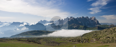 To use this stock image in your creative project, please select the size you need over to the right and click the "Add to Cart" button.
Your downloaded image will come with the Cutcaster watermark removed so don’t worry about the watermark you see on this page. Pale San Martino at morning stock photo, Summer view of dolomites mountain with cableway near San Pellegrino pass, Trentino, Italy. On the background Pale San Martino mountain. by ANTONIO SCARPI