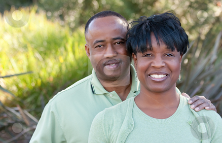 To use this stock image in your creative project, please select the size you need over to the right and click the "Add to Cart" button.
Your downloaded image will come with the Cutcaster watermark removed so don’t worry about the watermark you see on this page. Attractive Happy African American Couple stock photo, Attractive and Affectionate African American Couple posing in the park. by Andy Dean