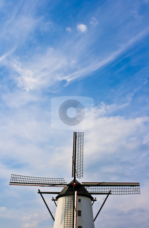 To use this stock image in your creative project, please select the size you need over to the right and click the "Add to Cart" button.
Your downloaded image will come with the Cutcaster watermark removed so don’t worry about the watermark you see on this page. Windmill stock photo, Windmill against nice blue sky by Interlight