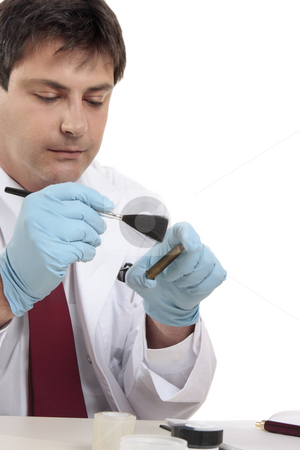 To use this stock image in your creative project, please select the size you need over to the right and click the "Add to Cart" button.
Your downloaded image will come with the Cutcaster watermark removed so don’t worry about the watermark you see on this page. Forensic scientist stock photo, Forensic scientist tests for fingerprints in attempt to solve a crime.. Focus to hands. by Leah-Anne Thompson