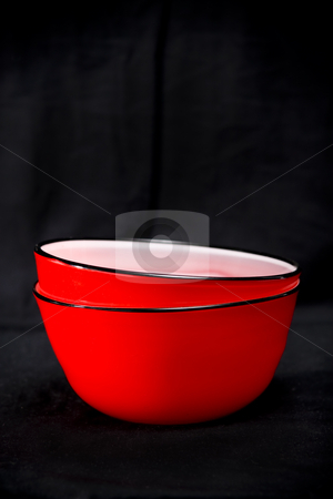 To use this stock image in your creative project, please select the size you need over to the right and click the "Add to Cart" button.
Your downloaded image will come with the Cutcaster watermark removed so don’t worry about the watermark you see on this page. Red bowls stock photo, Contemporary red bowls on a black background by Jodie Johnson