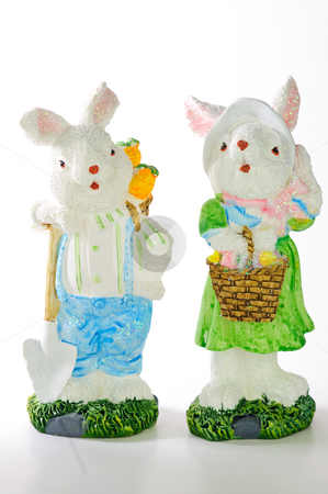 To use this stock image in your creative project, please select the size you need over to the right and click the "Add to Cart" button.
Your downloaded image will come with the Cutcaster watermark removed so don’t worry about the watermark you see on this page. Easter Bunnies stock photo, Colorful Easter Bunny Statues; isolated on white background. by Tammy Abrego