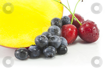 To use this stock image in your creative project, please select the size you need over to the right and click the "Add to Cart" button.
Your downloaded image will come with the Cutcaster watermark removed so don’t worry about the watermark you see on this page. Mango and berries stock photo, Mango, Blackberries and Cherries on white by Chris Alleaume