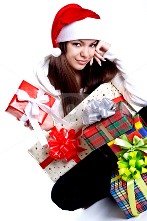 To use this stock image in your creative project, please select the size you need over to the right and click the "Add to Cart" button.
Your downloaded image will come with the Cutcaster watermark removed so don’t worry about the watermark you see on this page. Beautiful woman with holiday gift stock photo, Beautiful woman with holiday gift on a white background by Artem Zamula
