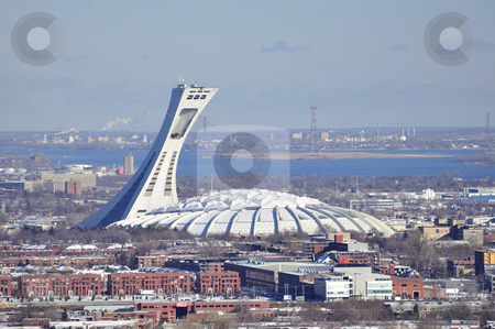 To use this stock image in your creative project, please select the size you need over to the right and click the "Add to Cart" button.
Your downloaded image will come with the Cutcaster watermark removed so don’t worry about the watermark you see on this page. Olympic Stadium, Montreal. stock photo, View of the Olympic Stadium and city of Montreal. by Fernando Barozza