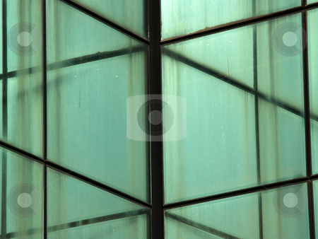 To use this stock image in your creative project, please select the size you need over to the right and click the "Add to Cart" button.
Your downloaded image will come with the Cutcaster watermark removed so don’t worry about the watermark you see on this page. Glass wall building stock photo, Glass wall building, mesh pattern by Portokalis