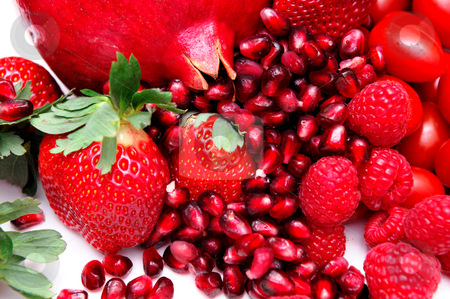 To use this stock image in your creative project, please select the size you need over to the right and click the "Add to Cart" button.
Your downloaded image will come with the Cutcaster watermark removed so don’t worry about the watermark you see on this page. Bright Red Fruit stock photo, Different red fruits including a whole Pomegranate and the little ruby seeds, strawberries and raspberries on white by Lynn Bendickson