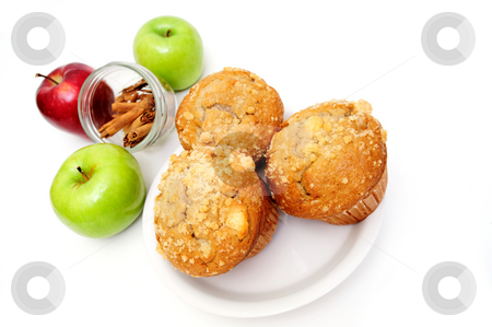 To use this stock image in your creative project, please select the size you need over to the right and click the "Add to Cart" button.
Your downloaded image will come with the Cutcaster watermark removed so don’t worry about the watermark you see on this page. Muffins On A Saucer stock photo, Apple spice muffin with red and green apples and stick cinnamon in the background isolated on white by Lynn Bendickson