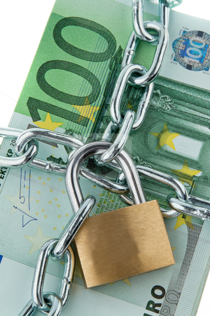 To use this stock image in your creative project, please select the size you need over to the right and click the "Add to Cart" button.
Your downloaded image will come with the Cutcaster watermark removed so don’t worry about the watermark you see on this page. Locked European Currency stock photo, European currency with chain and lock. Vertically framed shot. by Erwin Johann Wodicka