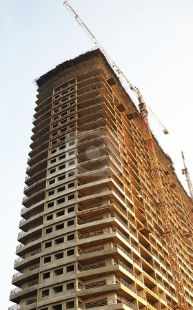To use this stock image in your creative project, please select the size you need over to the right and click the "Add to Cart" button.
Your downloaded image will come with the Cutcaster watermark removed so don’t worry about the watermark you see on this page. Incomplete building stock photo, New office building in the stage of development. by Oleg Blazhyievskyi