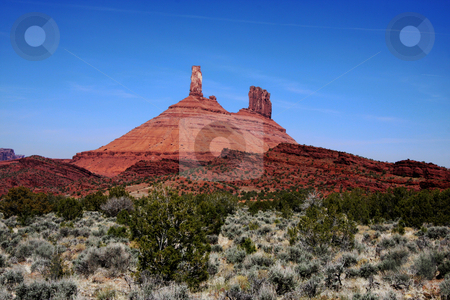 To use this stock image in your creative project, please select the size you need over to the right and click the "Add to Cart" button.
Your downloaded image will come with the Cutcaster watermark removed so don’t worry about the watermark you see on this page. Canyonlands National Park stock photo, View of the red rock formations in Canyonlands National Park with blue sky by Mark Smith