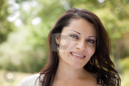 To use this stock image in your creative project, please select the size you need over to the right and click the "Add to Cart" button.
Your downloaded image will come with the Cutcaster watermark removed so don’t worry about the watermark you see on this page. Attractive Hispanic Woman in the Park stock photo, Attractive Hispanic Woman Portrait in the Park. by Andy Dean