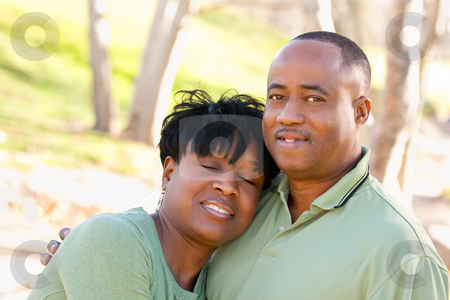 To use this stock image in your creative project, please select the size you need over to the right and click the "Add to Cart" button.
Your downloaded image will come with the Cutcaster watermark removed so don’t worry about the watermark you see on this page. Attractive Happy African American Couple stock photo, Attractive Happy African American Couple Posing in the Park. by Andy Dean