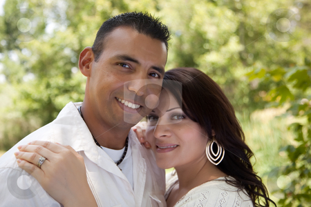 To use this stock image in your creative project, please select the size you need over to the right and click the "Add to Cart" button.
Your downloaded image will come with the Cutcaster watermark removed so don’t worry about the watermark you see on this page. Attractive Hispanic Couple in the Park stock photo, Attractive Hispanic Couple Portrait in the Park. by Andy Dean