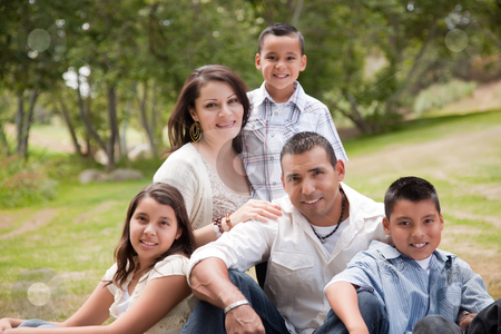 To use this stock image in your creative project, please select the size you need over to the right and click the "Add to Cart" button.
Your downloaded image will come with the Cutcaster watermark removed so don’t worry about the watermark you see on this page. Happy Hispanic Family In the Park stock photo, Happy Hispanic Family Portrait In the Park. by Andy Dean