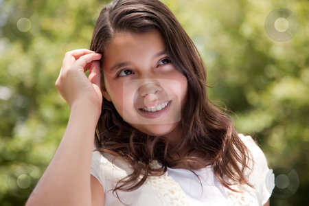 To use this stock image in your creative project, please select the size you need over to the right and click the "Add to Cart" button.
Your downloaded image will come with the Cutcaster watermark removed so don’t worry about the watermark you see on this page. Cute Happy Hispanic Girl in the Park stock photo, Cute Happy Hispanic Girl Portrait in the Park. by Andy Dean