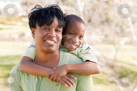 To use this stock image in your creative project, please select the size you need over to the right and click the "Add to Cart" button.
Your downloaded image will come with the Cutcaster watermark removed so don’t worry about the watermark you see on this page. Happy African American Woman and Child stock photo, Happy African American Woman and Child Having Fun in the Park. by Andy Dean
