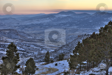 To use this stock image in your creative project, please select the size you need over to the right and click the "Add to Cart" button.
Your downloaded image will come with the Cutcaster watermark removed so don’t worry about the watermark you see on this page. Winter dusk at Colorado Rocky Mountains stock photo, Winter dusk at Colorado Rocky Mountains near Fort Collins - looking southwest from Horsetooth Mountain Park by Marek Uliasz