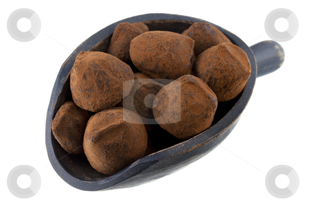 To use this stock image in your creative project, please select the size you need over to the right and click the "Add to Cart" button.
Your downloaded image will come with the Cutcaster watermark removed so don’t worry about the watermark you see on this page. Scoop of chocolate truffles stock photo, Chocolate truffles on a rustic wooden scoop isolated on white by Marek Uliasz