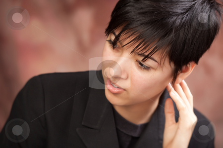 To use this stock image in your creative project, please select the size you need over to the right and click the "Add to Cart" button.
Your downloaded image will come with the Cutcaster watermark removed so don’t worry about the watermark you see on this page. Multiethnic Girl Poses for Portrait stock photo, Multiethnic Girl Poses for a Studio Portrait. by Andy Dean