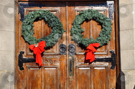 To use this stock image in your creative project, please select the size you need over to the right and click the "Add to Cart" button.
Your downloaded image will come with the Cutcaster watermark removed so don’t worry about the watermark you see on this page. Christmas wreath images stock photo, Christmas wreaths on church doors by Richard Sheehan