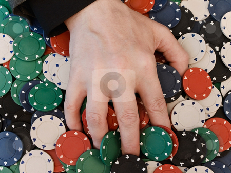 To use this stock image in your creative project, please select the size you need over to the right and click the "Add to Cart" button.
Your downloaded image will come with the Cutcaster watermark removed so don’t worry about the watermark you see on this page. Hand at the chips stock photo, Men's hand on dispersed in casino chips by Sergej Razvodovskij