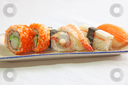 To use this stock image in your creative project, please select the size you need over to the right and click the "Add to Cart" button.
Your downloaded image will come with the Cutcaster watermark removed so don’t worry about the watermark you see on this page. Assorted sushi stock photo, Assorted japanese sushi seafood maki rolls on plate by Kheng Guan Toh