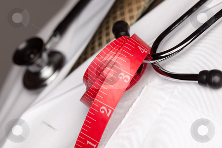 To use this stock image in your creative project, please select the size you need over to the right and click the "Add to Cart" button.
Your downloaded image will come with the Cutcaster watermark removed so don’t worry about the watermark you see on this page. Doctor with Stethoscope and Measuring Tape stock photo, Doctor with Stethoscope and Red Measuring Tape. by Andy Dean
