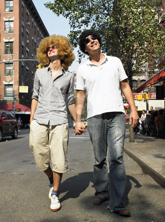 To use this stock image in your creative project, please select the size you need over to the right and click the "Add to Cart" button.
Your downloaded image will come with the Cutcaster watermark removed so don’t worry about the watermark you see on this page. Men In Wigs stock photo, Men in wigs walking down sidewalk holding hands. Vertical shot. by Mog Ddl