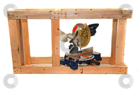 To use this stock image in your creative project, please select the size you need over to the right and click the "Add to Cart" button.
Your downloaded image will come with the Cutcaster watermark removed so don’t worry about the watermark you see on this page. Wood Project stock photo, The building of an aquarium stand with a miter saw by Jack Schiffer
