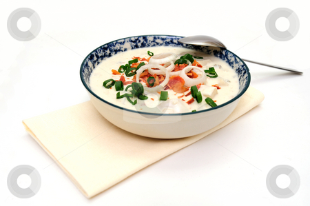 To use this stock image in your creative project, please select the size you need over to the right and click the "Add to Cart" button.
Your downloaded image will come with the Cutcaster watermark removed so don’t worry about the watermark you see on this page. Clam Chowder New England Style stock photo, Hot bowl of New England Clam Chowder with crumbled bacon, green and white onion rings in a blue and white bowl by Lynn Bendickson