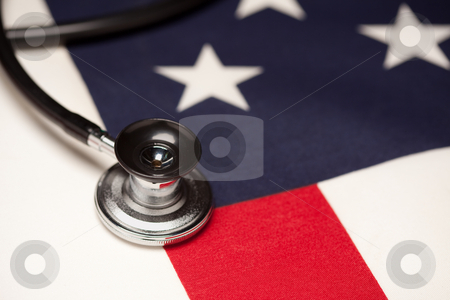 To use this stock image in your creative project, please select the size you need over to the right and click the "Add to Cart" button.
Your downloaded image will come with the Cutcaster watermark removed so don’t worry about the watermark you see on this page. Stethoscope on American Flag stock photo, Stethoscope on American Flag with Selective Focus. by Andy Dean