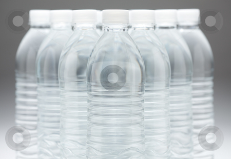 To use this stock image in your creative project, please select the size you need over to the right and click the "Add to Cart" button.
Your downloaded image will come with the Cutcaster watermark removed so don’t worry about the watermark you see on this page. Water Bottles Abstract stock photo, Water Bottles Abstract Image on a Gradated Background. by Andy Dean