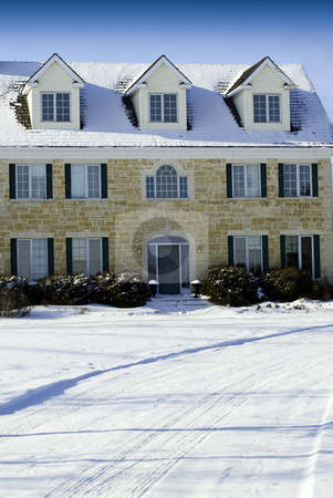 To use this stock image in your creative project, please select the size you need over to the right and click the "Add to Cart" button.
Your downloaded image will come with the Cutcaster watermark removed so don’t worry about the watermark you see on this page. Large Stone House stock photo, A large three story house made of stones taken during the winter. by Richard Nelson
