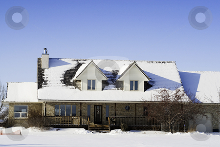 To use this stock image in your creative project, please select the size you need over to the right and click the "Add to Cart" button.
Your downloaded image will come with the Cutcaster watermark removed so don’t worry about the watermark you see on this page. Winter House stock photo, A large house with snow on the roof, shot against a clear blue sky by Richard Nelson