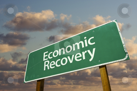 To use this stock image in your creative project, please select the size you need over to the right and click the "Add to Cart" button.
Your downloaded image will come with the Cutcaster watermark removed so don’t worry about the watermark you see on this page. Economic Recovery Green Road Sign stock photo, Economic Recovery Green Road Sign with dramatic clouds and sky. by Andy Dean