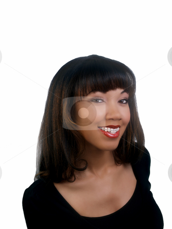 To use this stock image in your creative project, please select the size you need over to the right and click the "Add to Cart" button.
Your downloaded image will come with the Cutcaster watermark removed so don’t worry about the watermark you see on this page. Smiling portrait of black woman with braces upper teeth stock photo, Portrait of pretty African American woman with braces by Jeff Cleveland