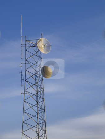 To use this stock image in your creative project, please select the size you need over to the right and click the "Add to Cart" button.
Your downloaded image will come with the Cutcaster watermark removed so don’t worry about the watermark you see on this page. Telecommunications tower with blue sky in background stock photo, Small telecommunications mast with blue sky and white clouds in background by Marek Uliasz