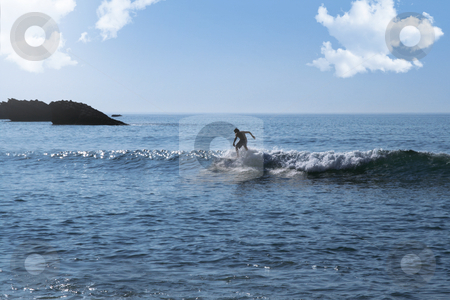 To use this stock image in your creative project, please select the size you need over to the right and click the "Add to Cart" button.
Your downloaded image will come with the Cutcaster watermark removed so don’t worry about the watermark you see on this page. Surfer stock photo, Surfer silhouette on the ocean with rocks in background by Laurent Davoust