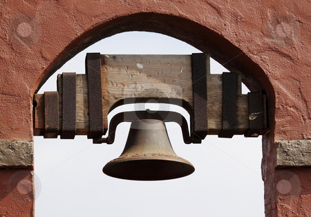 To use this stock image in your creative project, please select the size you need over to the right and click the "Add to Cart" button.
Your downloaded image will come with the Cutcaster watermark removed so don’t worry about the watermark you see on this page. Bell stock photo, Old Spanish style bell hanging in a red brick wall by Henrik Lehnerer