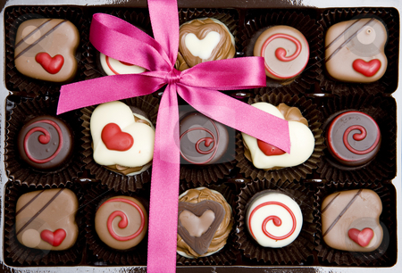 To use this stock image in your creative project, please select the size you need over to the right and click the "Add to Cart" button.
Your downloaded image will come with the Cutcaster watermark removed so don’t worry about the watermark you see on this page. Chocolate stock photo, Chocolate box by Richard Semik